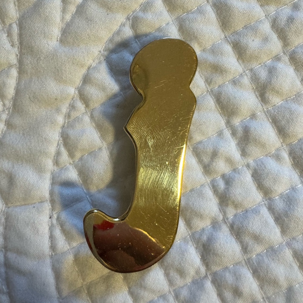 Gold Hook-Shaped Accessory
